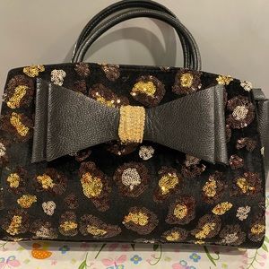 Cute black and gold sequin purse with big bow